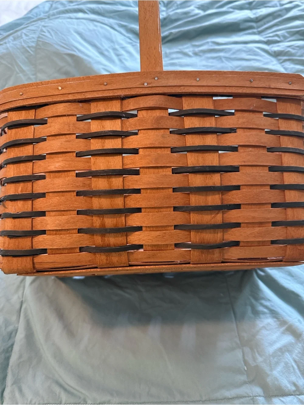 Longaberger Two-Tone Woven Basket in Brown and dark green.